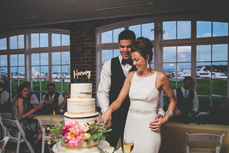 bride groom cutting cake