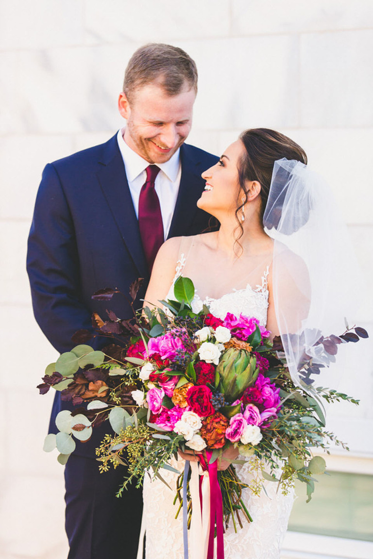 groom and bride laughing